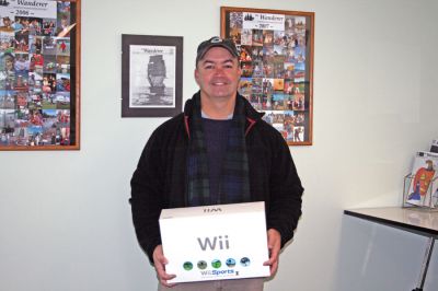 Wii Winner
Shaun Walsh of Marion was the grand prize winner in our second annual Halloween Short Story Contest for penning the eerie "The Legend of Captain Blackmore." Shaun received a Nintendo Wii game system for his effort which he picked up at our office earlier this week. (Photo by Pat Aleks).
