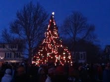 Mattapoisett Tree Lighting 2011
Mattapoisett lit one of the biggest trees Shipyard Park has ever seen at the 2011 Holiday in the Park. There was food from local establishments, ornament making, merry music and Santa! The moment was enough to spur two romantic marriage proposals. Photo by Anne Kakley.
