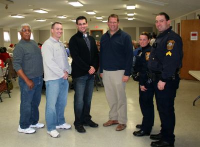 Marion Police Brotherhood Party
Left to right: retired officer George Pina, Sgt. Jeff Tripp, Officer Anthony DiCarlo, Police Chief Lincoln Miller, Officer Alishia Chandler and Sgt. Rich Nighelli of the Marion Police Brotherhood were on hand as the Brotherhood hosted a holiday dinner for seniors at the Marion Social Club on Saturday afternoon, December 17, 2011. Photo by Robert Chiarito.

