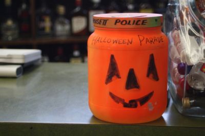 Halloween Parade Pumpkins
The pumpkins are starting to appear around town! Officer Brett Osetkowski dropped off this pumpkin to Seahorse Liquors yesterday. The money collected from the pumpkins goes to support the annual Halloween parade. Photo by Anne Kakley.
