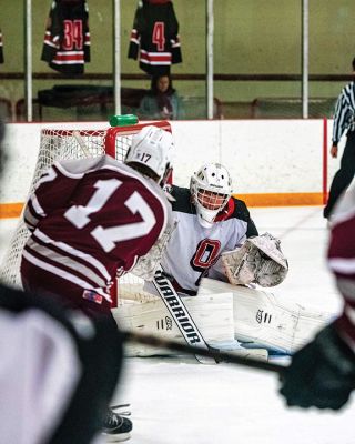 Tucker Roy
Tucker Roy is focused as a sophomore backstopping the Old Rochester/Fairhaven hockey team. Photo by Ryan Feeney
