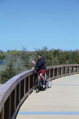 Mattapoisett Bike Path
A newly signed Memorandum of Understanding between the Town of Mattapoisett and the Commonwealth of Massachusetts has opened the Shining Tides section of the Mattapoisett Bike Path. On Monday, people and dogs could be seen along the attractive structure that connects Reservation Road to Goodspeed Island Road. Photos by Mick Colageo
