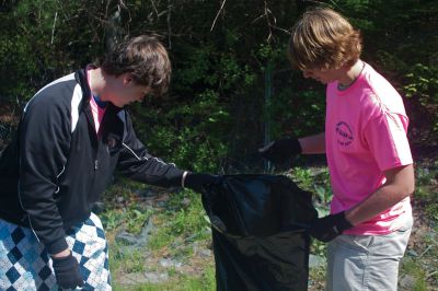 Marion Clean Up
Marion residents gathered together at Music Hall on Saturday, May 12, 2012, for the annual town-wide trash pick-up.  Volunteers spread out over town picking up garbage and recyclable materials from the road side. Photo by Eric Tripoli.
