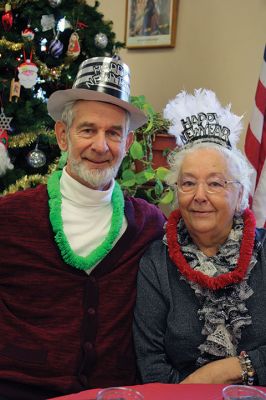 New Year’s Eve Party
A New Year’s Eve party at the Rochester Senior Center gave area seniors the chance to ring in the New Year early in the company of friends. Guests enjoyed dinner and dessert followed by the sharing of New Year’s resolutions and non-alcoholic bubbly. Balloons dropped from the ceiling at 1:30 pm after a symbolic countdown to the New Year, and guests made a ruckus with noisemakers to welcome 2016. Photos by Jean Perry
