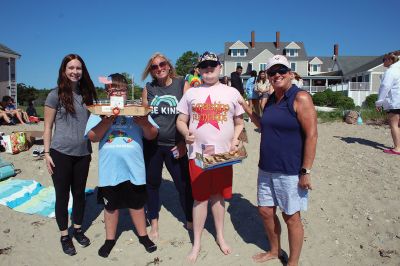 Cardboard Boats
Grade 7 students at Old Rochester Regional Junior High School took to the beach on Tuesday morning for a field day at the Mattapoisett YMCA that featured a cardboard boat race. The boats were designed entirely of cardboard and duct tape. The SCOPE program also included making tie-dye T-shirts. Photos by Mick Colageo
