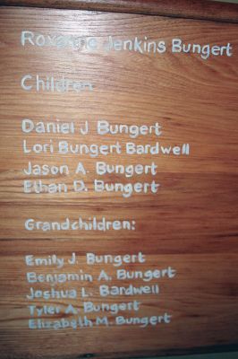 Center School Donation
An antique church pew gifted to Center School by James and Roxanne Bungert features a painted depiction of landmarks throughout Mattapoisett, including the school. Photo by Marilou Newell
