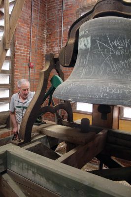 Center School Clock
Behind the clock that faces all four directions at Center School are three levels of mechanics that make the hands move, the bell ring and the machine operate. The clock serves as an in-house museum for schoolchildren to learn about how things worked before the digital age. Photos by Mick Colageo
