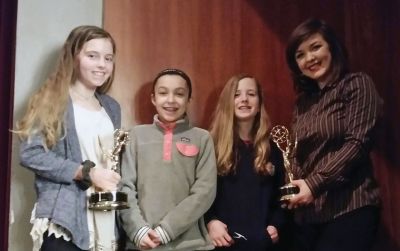 Sippican School Cub Reporters Team
These three 6th grade members of the Sippican School Cub Reporters Team (Ava Noone, Rosie Lally and Katie Parks) met with nine-time Emmy Award winning Producer Angela Harrer from her new TV show The Folklorist at the New England High School Television and Film Conference at Millis High School on April 5. Photo courtesy Frank D. Noone
