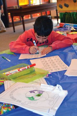 Marion Natural History Museum 
The Marion Natural History Museum hosted their very first Earth Day Celebration on April 19, providing little ones with activities that focused on our planet and stimulated their senses. There was a make your own planet earth pinwheel table, a station to decorate your own “Earth cookie” with green and blue icing, a puppet show stage, and a boat load of Legos to play with while the sounds of croaking frogs and crickets played in the background. Photo by Jean Perry
