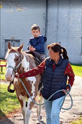 ORR’s Fall Family Fun Day
Ben Marks, of Mattapoisett, enjoys a pony ride in the ORR courtyard during the October 24 event.

