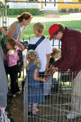 Grandparent's Day
It was a perfect autumn day for the SouthCoast Senior Resource Alliance Grandparents Day at Hiller Farm in Rochester on September 19. Children and their grandparents had fun playing bean-bag toss, bocce, posing with the Three Stooges, and more. The face-painting and petting zoo areas were a complete hit! Most importantly, the free event provided information to seniors on health services available in the SouthCoast area. Photo by Anne OBrien-Kakley
