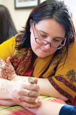 Library Henna
The Elizabeth Taber Library hosted a henna tattoo program for teens, with each guest receiving their own henna creation by professional henna artist Heather Cault-Nulton. The art of henna dates back thousands of years and has recently grown in popularity. As part of a new initiative to draw teens into the library, the afternoon henna event was held on March 1 and attracted 13 area teens to experience the beauty of henna. Photos by Colin Veitch
