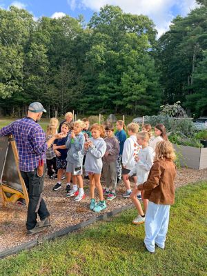 Marion Institute
Marion Institute Educator Nate Sanders gathers fourth-grade students for a taste of what's growing in the Old Hammondtown School garden and gives them an overview of what they'll be learning throughout the school year. Photo courtesy of Amanda Chamberlin
