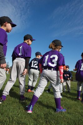 Old Rochester Little League
The Old Rochester Little League celebrated its Opening Day of the 2016 season on Saturday, April 30 at Gifford Park off Dexter Road in Rochester. The young athletes took part in the traditional Opening Day parade, which began at Dexter Park and concluded at Dexter Field. The players then circled the field for the National Anthem, with a flyover by Glenn Lawrence in his plane. After opening ceremonies, the first games of the season were held. Photo by Colin Veitch
