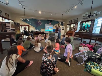 Marion Natural History Museum
The Marion Natural History Museum’s after school group had a fun time learning about the type of habitat terrapins need to survive and some of the hazards they face while they’re on land. From nest destruction and predation from coyotes and raccoons, and accidents when people and dogs are unaware of their presence, these animals need all the help they can get. Thankfully, Marion resident Debra Ewing and New England Coastal Wildlife Alliance (NEWCA) volunteers such as Gia Goodwin are there to help them get s
