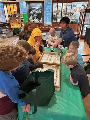 Marion Natural History Museum
The Marion Natural History Museum’s afterschool group had a terrific time learning about how some of our most common bugs survive the winter. From stink bugs to yellow jackets, caterpillars to grasshoppers, all have a plan to survive till next spring. Many thanks to Blake Dinius of Plymouth County Extension Service for a fun and educational program. Photo by Elizabeth Leidhold
