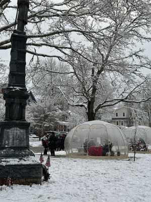Marion Village Christmas Stroll
The Marion Village Christmas Stroll was this past cold and snowy Sunday. Santa and Ms. Clause arrived by their usual boat, though the cold and the wind sure made it look difficult to dock. Excited kids hurled snowballs all around (and at each other) as they waited for St. Nick. Photo by Sam Bishop
