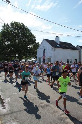 Mattapoisett Road Race
Will Benoit and Margot Appleton defended their respective men’s and women’s titles in the July 4 Mattapoisett Road Race, and competitors were greeted by favorable weather for the 9:00 am start. Photos by Mick Colageo
