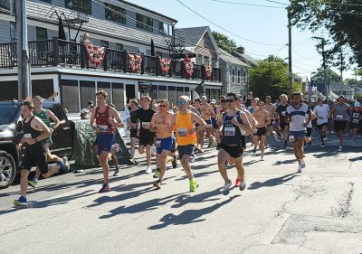 Mattapoisett Road Race 
The 55th Mattapoisett Road Race was held on Independence Day kicking off from Shipyard Park as morning temperatures at start already crept over 85. In the end, 1387 racers crossed the finish line after the 5K. Photos by Shawn Sweet

