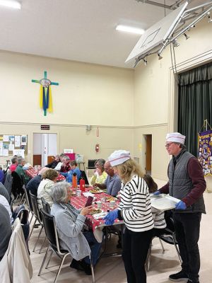 Mattapoisett Lions Club Senior Dinner
On Saturday, April 18, the Mattapoisett Congressional Church hosted the Mattapoisett Lions Club Senior Dinner. Nearly every seat in the hall was taken up by local seniors chowing down on a full turkey dinner; which also included apple pie for dessert. Live music was also performed as the Lions Club and church staff scurried between the kitchen and dinning area in order to serve their many guests. Photo by Sam Bishop. April 23, 2026 edition
