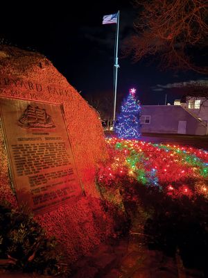 Mattapoisett’s Shipyard Park
Mattapoisett’s Shipyard Park Christmas tree flanked by the park’s sign. Those who have passed by at night were treated to the park’s lanterns’ warm, fiery glow. The gazebo is also lit, as well as there being a small installation at the end of the Town Wharf. Photo by Sam Bishop - December 25, 2025 edition
