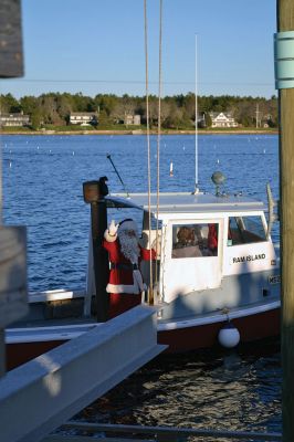 Marion Village Stroll
There were hundreds strolling the streets during the 2014 Marion Holiday Stroll on December 14. Celebrity sightings included Santa Claus on his carriage, the Grinch, the Nutcracker, and Sparky the Fire Dog. The Showstoppers and The Sippican School Marching Band lit up the afternoon until the tree lighting ceremony lit up the night, the finale of that starry-skied evening. Photos by Felix Perez and Jean Perry 
