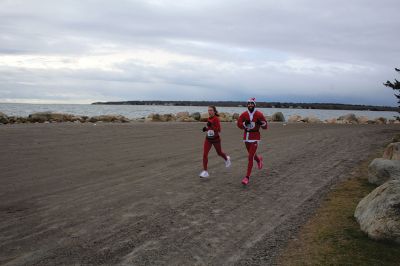 Mattapoisett Santa Stampede
The Mattapoisett Santa Stampede took place on Saturday, December 6 with over 300 Santas taking place. The 5K began at Shipyard Park and cut down Ned’s Point Road to the point, around the lighthouse and back. The Grinch led the pack on his bike, and residents stood by to cheer on all the runners. Photos by Sam Bishop and Mick Colageo
