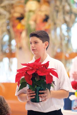 ORRJH Thanksgiving Banquet 
ORR Junior High School eighth-graders hosted the annual Thanksgiving Banquet for Tri-Town Seniors on Sunday, November 22. About 90 student volunteers helped pass out turkey dinners and raffle prizes, and cafeteria staff also volunteered their time to provide a delicious meal of thanks to area senior citizens. Photos by Colin Veitch
