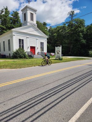 Patriot Half Triathlon
Riders and runners navigated overlapping courses on North Street in Rochester during the Patriot Half Triathlon held on June 15. Photos by Mick Colageo
