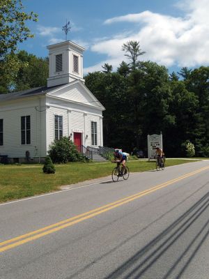 Patriot Half Triathlon
Riders and runners navigated overlapping courses on North Street in Rochester during the Patriot Half Triathlon held on June 15. Photos by Mick Colageo

