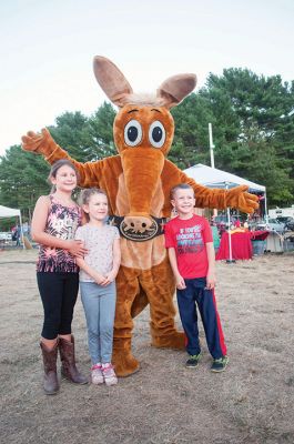 Rochester Country Fair
The Rochester Country Fair rolled into town on Thursday, August 18, filled the air with the sweet smells of Italian sausage and fried fair food, mixed with the smoke of diesel engines, and created that magical scent we all relish until the fair wrapped up on Sunday, August 21. Tractor pulls, animal shows, kids’ games, music, and wrestling (including the match between The Aardvark and Buck Chuck) delighted us while it lasted in the bucolic setting of Rochester, Massachusetts. Photos by Felix Perez and Jean P
