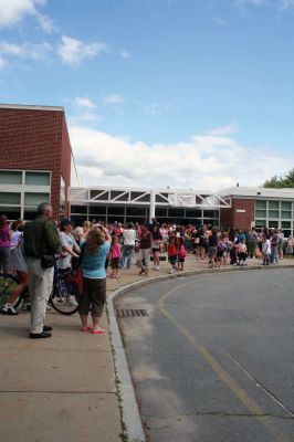 Summer Serenade 
Teachers sang and played instruments at Rochester Memorial School on June 18, 2010, the last day of school, as students waved goodbye from their school buses. Photo by Laura Pedulli.
