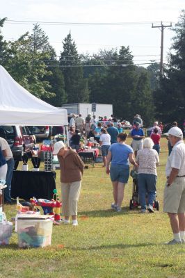 Flea Market Fun
It was impulse-buying heaven at the 36th Annual Arts and Crafts Flea Market on September 5. The First Congregational Church of Rochester hosted the Market, which featured lots of eclectic vendors, baked goods, and local organizations. Photo by Anne O'Brien-Kakley
