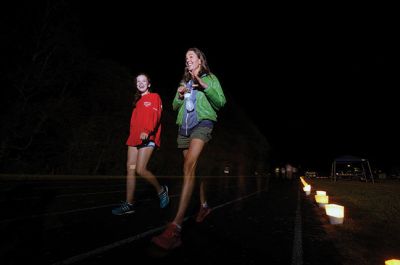 2015 Tri-Town Relay for Life
The 2015 Tri-Town Relay for Life raised over $35,000 this year, with proceeds going to benefit The American Cancer Society. The all-night event at the Old Rochester Regional High School track is a special event when the community honors cancer survivors and remembers loved ones who lost their battle with cancer, in addition to raising funds for a cure. Photos by Felix Perez
