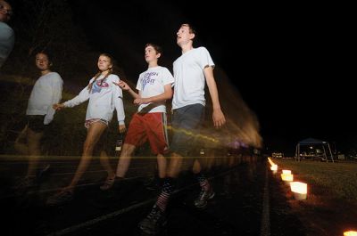 2015 Tri-Town Relay for Life
The 2015 Tri-Town Relay for Life raised over $35,000 this year, with proceeds going to benefit The American Cancer Society. The all-night event at the Old Rochester Regional High School track is a special event when the community honors cancer survivors and remembers loved ones who lost their battle with cancer, in addition to raising funds for a cure. Photos by Felix Perez
