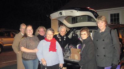 Rochester Women's Club
Members of the Rochester Women's Club gathered good together for a local family in need.  Every year, the club adopts a family to provide some holiday cheer for them.  Photo courtesy of Rochester Women's Club. 
