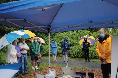 Osprey Marsh Accessible Boardwalk
Despite a downpour perfectly timed for its planned gathering on Friday off Point Road in Marion, the Sippican Lands Trust celebrated the completion of the new Osprey Marsh Accessible Boardwalk. Executive Director Jim Bride and president Alan Harris held a live Zoom meeting for those who could not attend, and some of the donors for the project assisted in the ribbon-cutting. The boardwalk is open by appointment. See story by Marilou Newell. Photo by Mick Colageo
