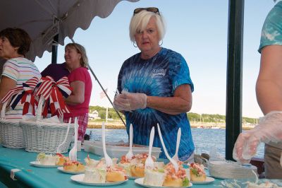 Taste of the Town
People with a taste for fine food flocked to Shipyard Park in Mattapoisett on the evening of Tuesday, July 12 for the annual Taste of the Town. Local restaurants and cafés dole out servings of their specialty foods for ticket holders to the event hosted by the Mattapoisett Woman’s Club. The event is the biggest yearly fundraiser for the Woman’s Club. Photos by Colin Veitch
