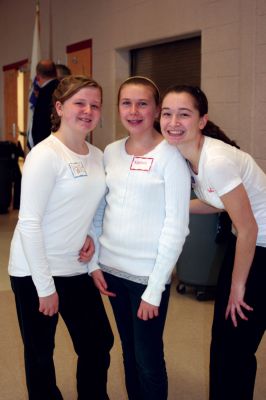 Senior Thanksgiving Banquet 
Eighth graders Katie Colwell, Katelyn Bergenheim and Meghan Cote demonstrated the spirit of giving during a special Thanksgiving banquet for seniors held at ORR on November 21, 2010. Photo by Laura Pedulli.
