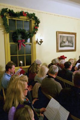 Tinkhamtown Chapel
The annual Christmas carol sing-along at the Tinkhamtown Chapel was as popular and beautiful as ever on the chilly evening of December 20, when dozens of people followed the glow of candlelit windows to the tiny chapel to sing with their families and neighbors and welcome Christmas to Mattapoisett. Photos by Colin Veitch
