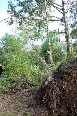 Tornado in Mattapoisett
An EF-1 tornado touched down late Tuesday morning in Mattapoisett. The unusual weather event downed power lines and hundreds of trees, knocking out power to many homes north of Route 195. Television news crews descended from Boston, as the Mattapoisett Fire and Police departments worked with utility companies and many power lines to clean up roads and assist area residents coming home to frightening scenes. Photo by Mick Colageo
