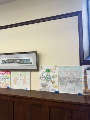 Mattapoisett Free Public Library
Mid-deliberation! Last weekend at the Mattapoisett Free Public Library, art created by students of Ms. Greta Anderson’s art class at Old Hammondtown School was on display. But not just any art, this was for the Annual Arbor Day Poster Contest sponsored by the state and the Mattapoisett Tree Committee. This year, the theme was “If Trees Could Talk.” 34 students submitted art to be voted upon. The winner will go to the state competition in Boston. Photo by Sam Bishop
