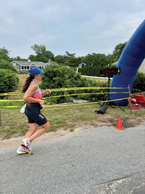 Mattapoisett Triathlon
The Mattapoisett Triathlon took place on Sunday, July 27. The event, hosted by the Mattapoisett Lions Club, saw over 100 competitors begin from Town Beach, swim 0.25 miles, bike 10 miles north of town and back, and finally run a 5K past Ned’s Point and back around to the beach. Photo by Robert Pina
