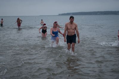Christmas Day Swim
On Tuesday, December 25, many Tri-Town residents braved the chilly temperatures and jump into Mattapoisett Town Beach for the 12th Annual Christmas Day Swim.  All of the proceeds benefitted the Helping Hands and Hooves organization, which provides therapeutic horseback rides to people with disabilities.  Photo by Felix Perez. 
