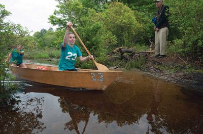 Memorial Day Boat Race
Keeping with an 80 year-old tradition, people with their home made boats raced toward the finish line during the annual Rochester Memorial Day Boat Race. Beginning at Grandma Hartley’s Reservoir on Snipatuit Road, boaters paddled the almost 12-mile race route to Herring Weir at River Road in Mattapoisett. There were 65 teams in all. Photo by Felix Perez.
