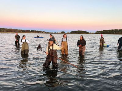 Mattapoisett
West Coast guests experience quahogging in October. Photo by Cecile Callahan

