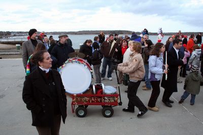 Strike Up the Band
A member of the Sippican School Band prepares to drum up some support during the annual Village Stroll held on Sunday, December 14. (Photo by Robert Chiarito).
