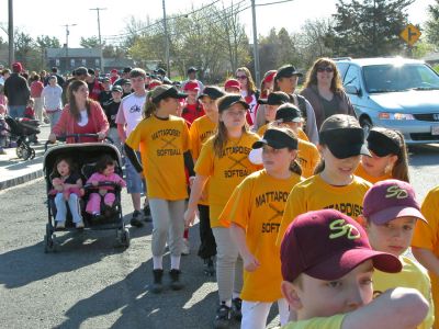 Mattapoisett Opening Day 2007
Opening Day Ceremonies for the 2007 season of Mattapoisett Youth Baseball (MYB) included special guests and local legends such as former American Idol contestant Ayla Brown, who sang the National Anthem and threw out the ceremonial first pitch, and former Boston Red Sox pitcher Brian Rose. The day also included a tribute to longtime MYB supporter and former Mattapoisett Recreation Director John Haley with the field at Old Hammondtown School in his honor. (Photo by Robert Chiarito).
