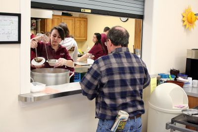 Cooking Class
Members of the Old Colony Regional Vocational Technical High School Culinary Arts Program recently served one of their monthly luncheons to residents at the Rochester Senior Center. Under the supervision of program director Scott Botelho, the students took over the kitchen at the Senior Center to share their cooking talents and prepare some Venus De Milo style soup and meatball subs. (Photo by Robert Chiarito).

