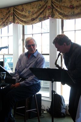 Poetic Jazz
Ellen Flynn and members of the Friends of the Mattapoisett Library welcomed poet Franklin D. Reeve to the Kinsale Inn in Mattapoisett on Sunday April 5 as part of the library's celebration of National Poetry Month. Mr. Reeve performed his piece, The Blue Cat Walks the Earth, accompianied by improvisational jazz muscians Don Davis and Joe Deleault in a performance dedicated to the memory of the late Library Director Judy Wallace. (Photo by Robert Chiarito)
